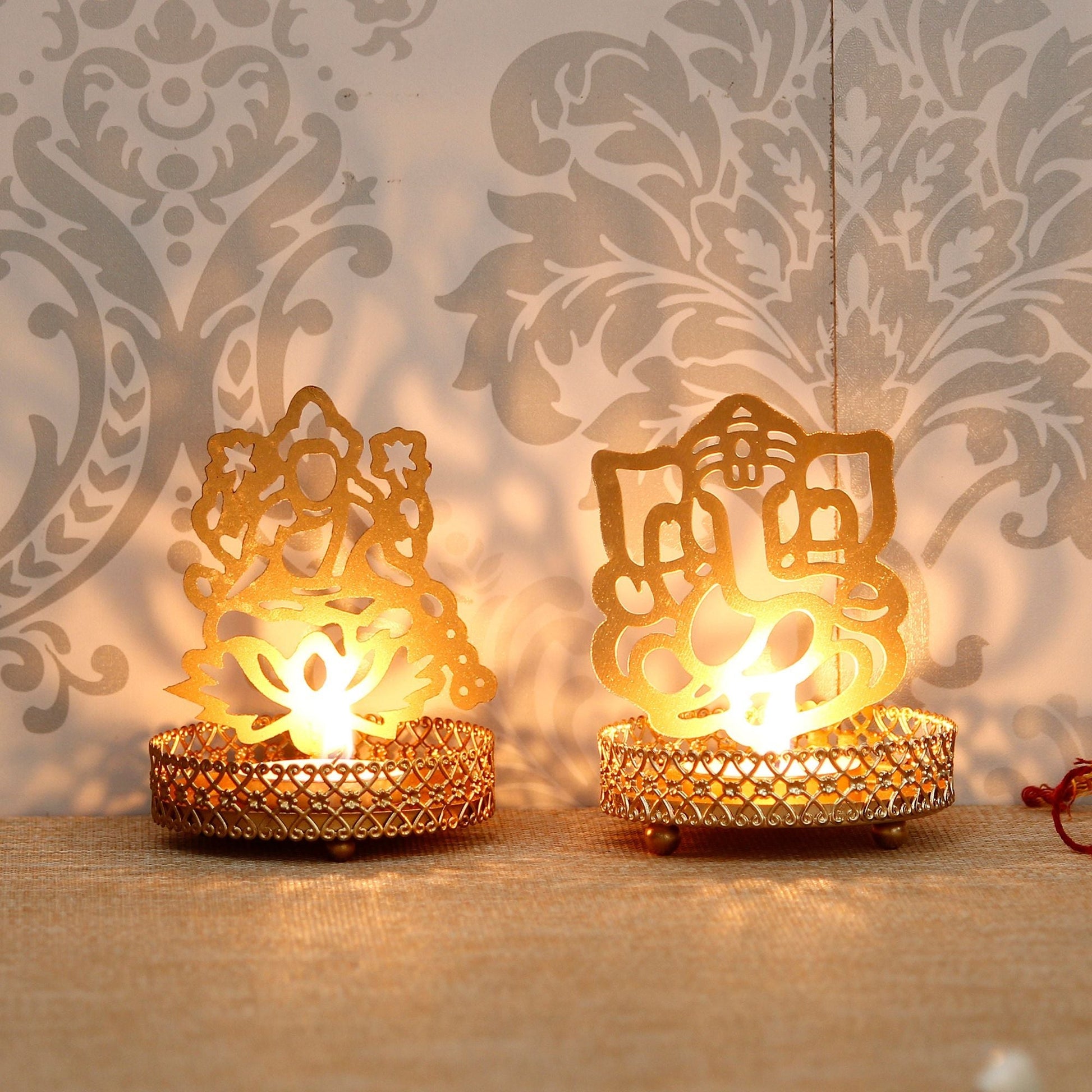 eCraftIndia Lord Ganesha and Laxmi Shadow Tea Light Holder - Deal IND.
